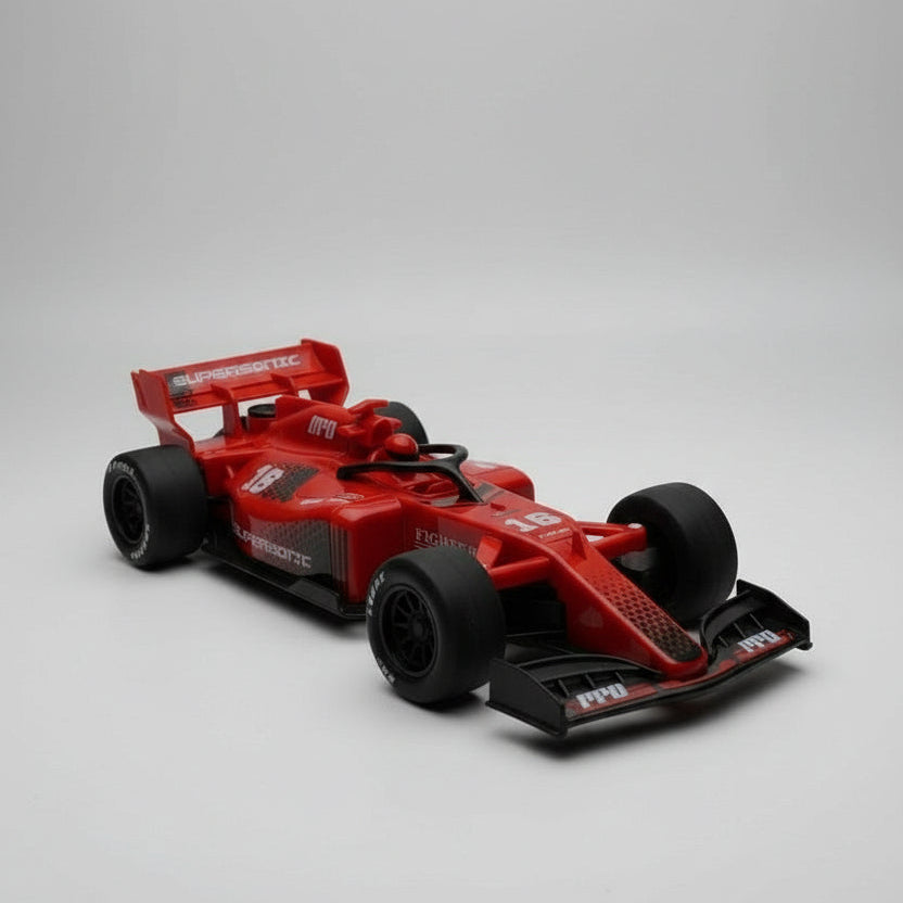 Red Formula 1 car model on a gray background